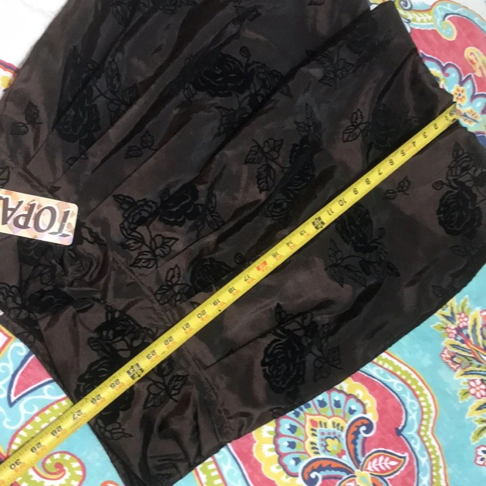 Metallic bronze dark floral bubble skirt with velvet rosette